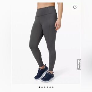 Black Lulumon Leggings with Pockets & Reflective Strip